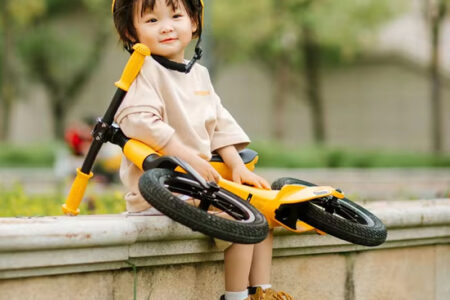 A Young Boy Doesn'T Want To Ride His Kids Bike