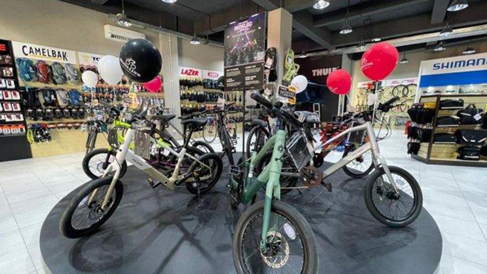 Polygon electric bikes are displayed in a bike shop