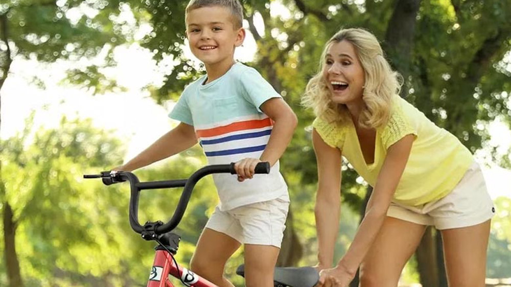 Teaching kids how to ride a BMX bike