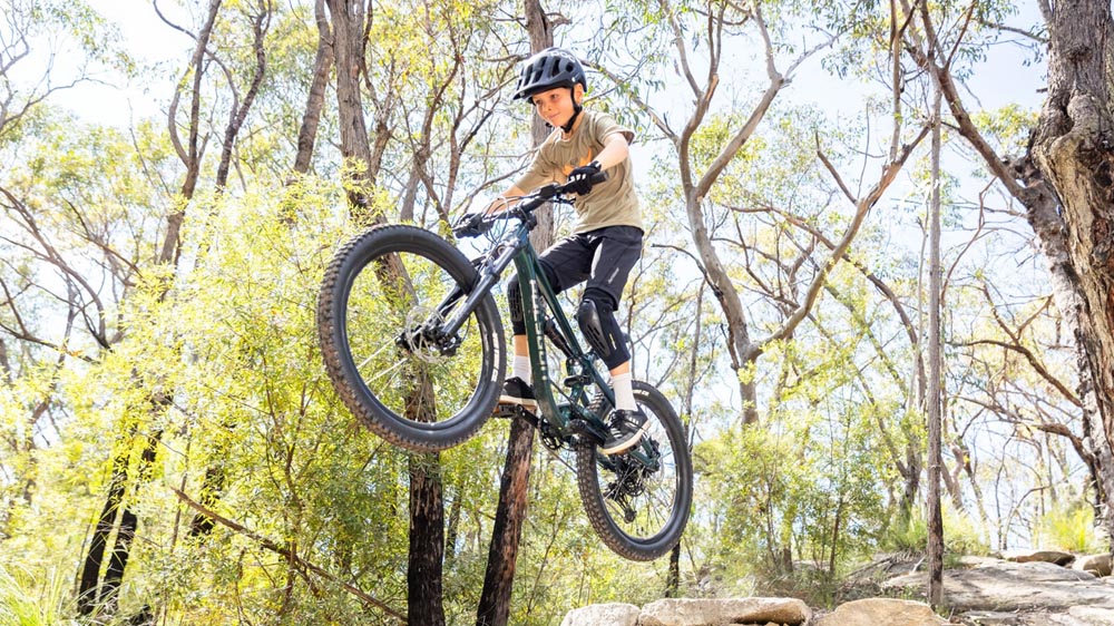 Riding confidently on a well fitted junior MTB