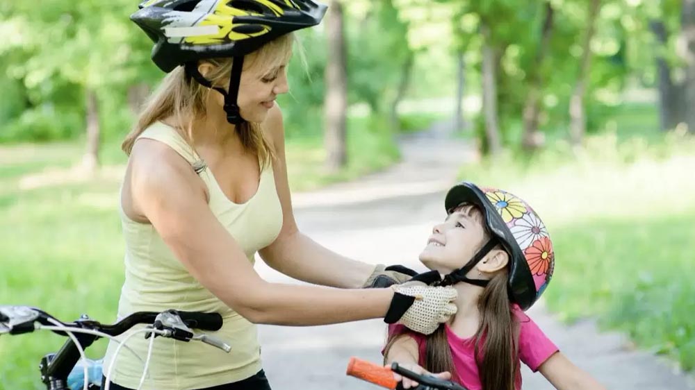 Wearing a bike helmet to prepare for MTB adventure