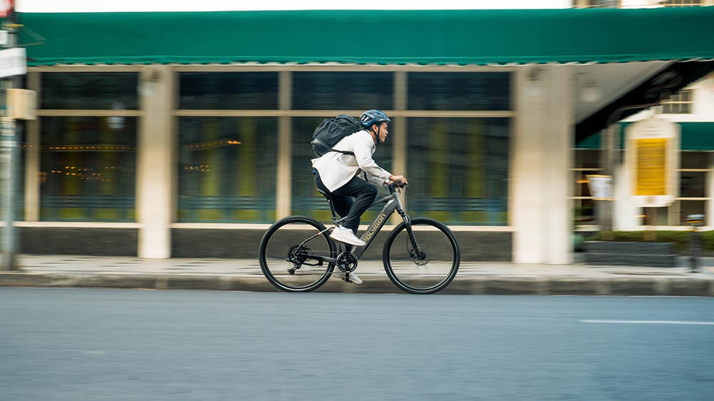 Rider on a multi day tour using an electric touring bicycle