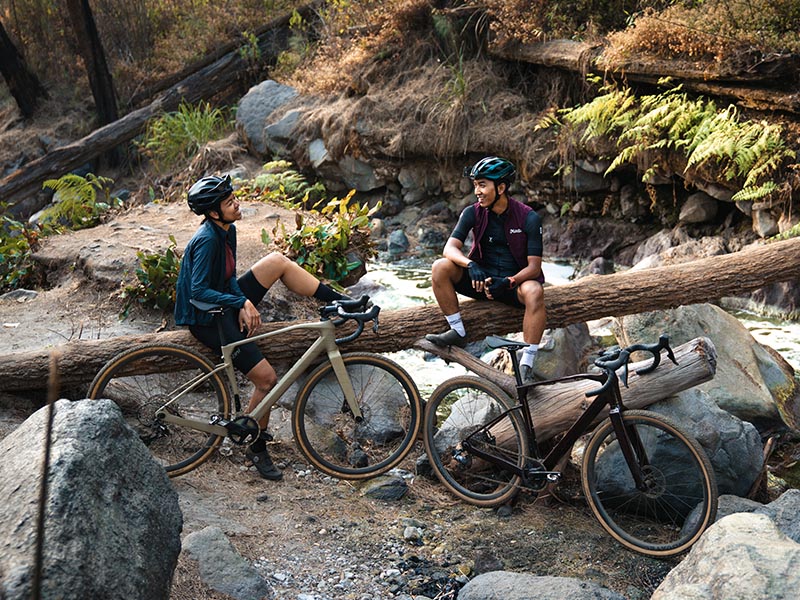 Rider Cruising Off Road With A Polygon Gravel Bike