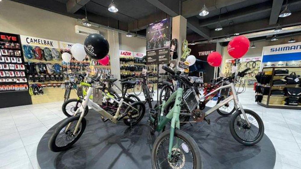 Comparing mini velo bikes at a local bicycle shop