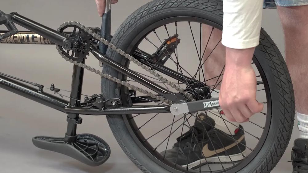 Replacing a worn BMX chain with a durable new one