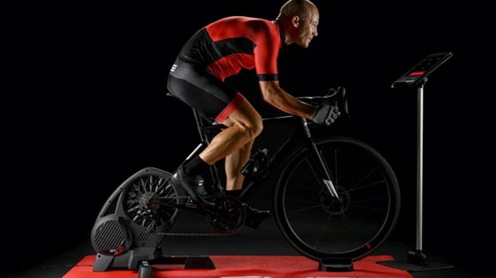 Cyclist applying power breathing for a sprint burst
