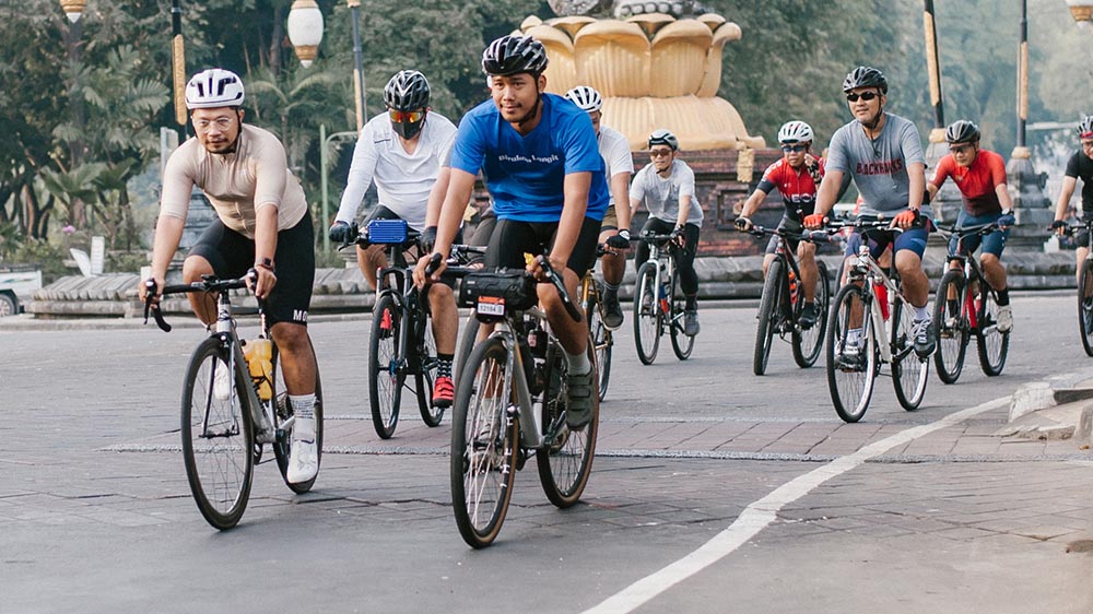 Group of road cyclists on a long distance ride