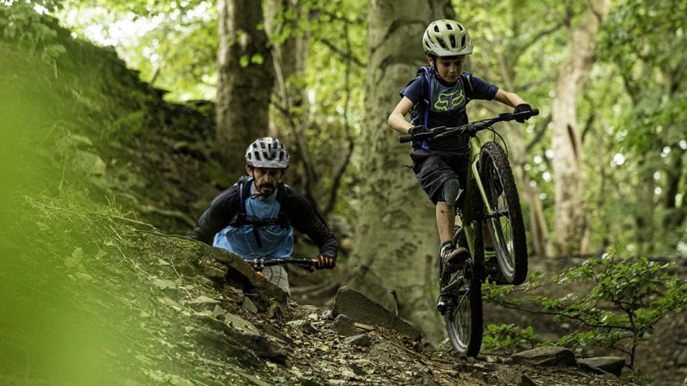 Child experiencing the excitement of a kids mountain bike ride
