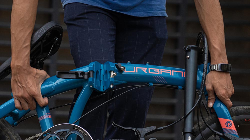An Expert Taking Care Of The Folding Bike Maintenance