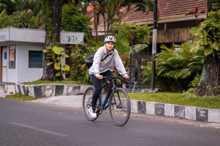 Happily Cycling On The Road