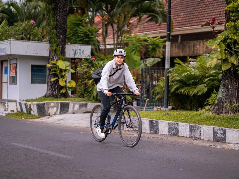 Happily Cycling On The Road