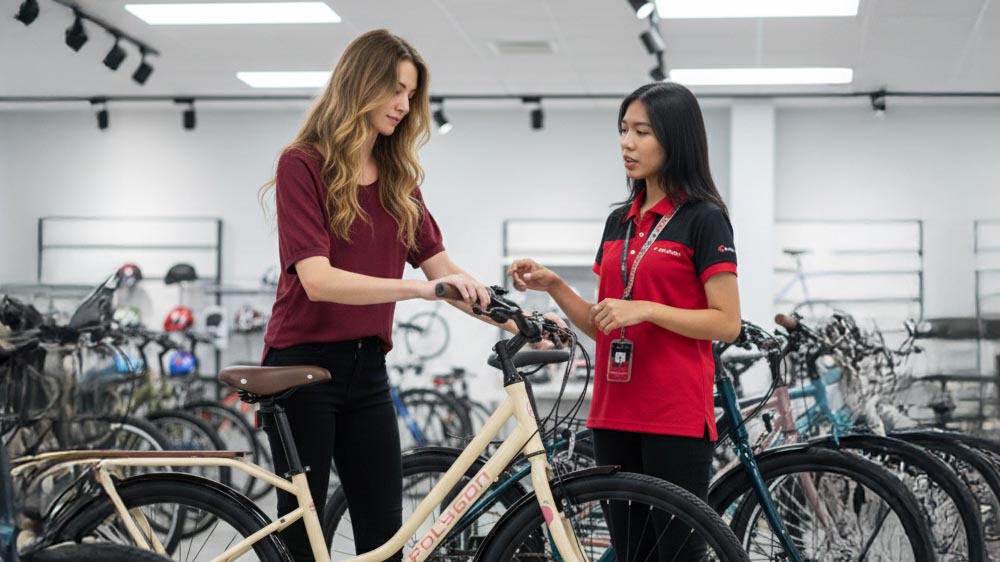 Checking The City Bike’s Components In A Bike Shop