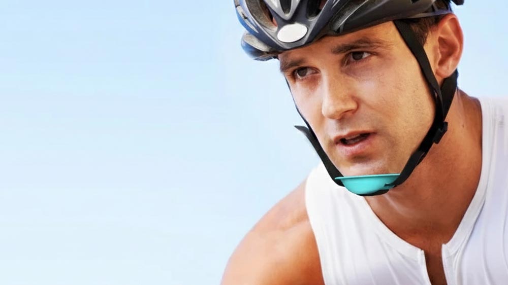 A Bmx Rider Is Wearing A Mouthguard