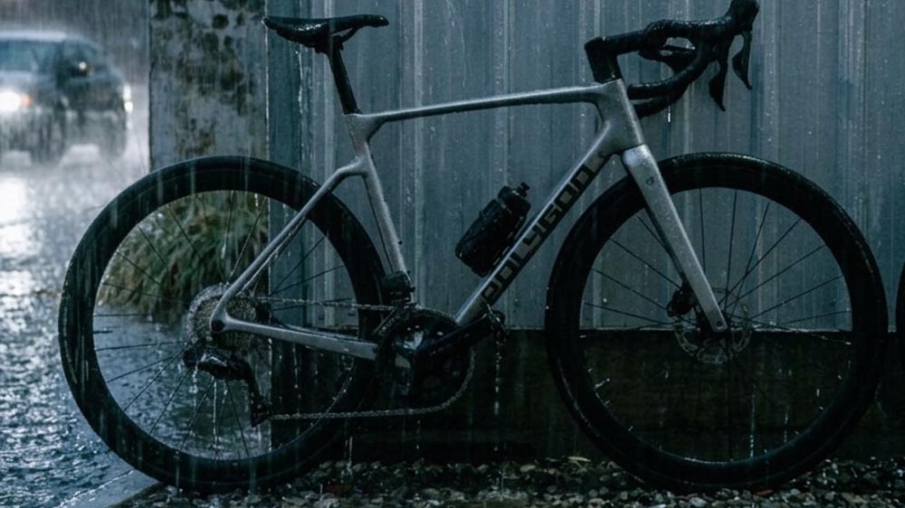 A Bicycle Is Parked Outside While It Is Raining