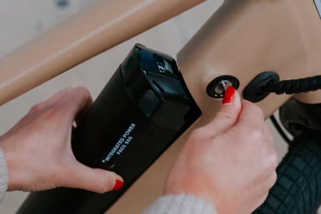 Uninstalling An E-Bike Battery From Its Frame