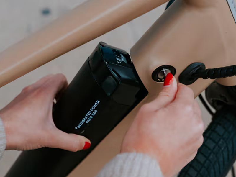 Uninstalling An E-Bike Battery From Its Frame